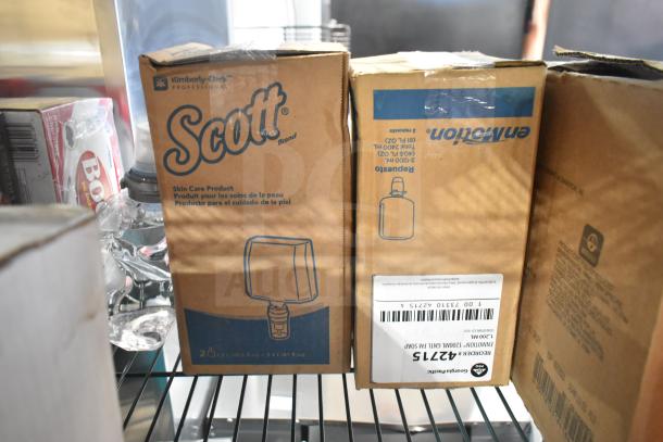 Tier lot including Boost drinks, Scott skin care product, GoJo luxury foam handwash boxes, in clean packaging.