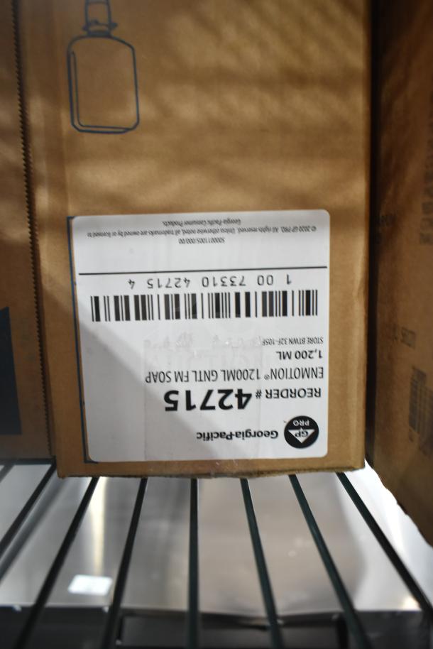 Auction item including Boost Drinks and GoJo Luxury Foam Handwash in original packaging on a metal shelf. Visible label: "GoJo Emnotion 1200mL FM Soap, Reorder #42715."