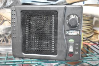 RoadPro RPSL-681P vehicle heater/fan, 300W, 25A, 12VDC, features fan speed control, dual function switch, used condition.