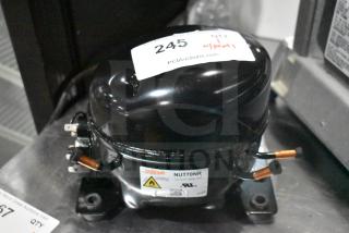 BRAND NEW SCRATCH AND DENT! Cubigel NUT70NR Motor, 115-127V, 1 Phase, visible scratch, labeled with model details.