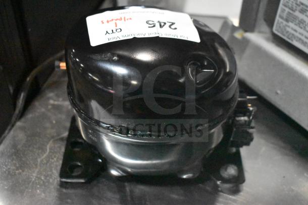 BRAND NEW Cubigel NUT70NR Motor, 115-127V, 1 Phase. Scratch and dent condition. Auction tag visible.