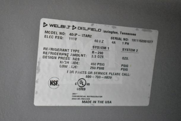 Label on 2019 Delfield 406P-STAR2 cooler. Shows model, electrical requirements, refrigerant type, and pressures. Made in USA.