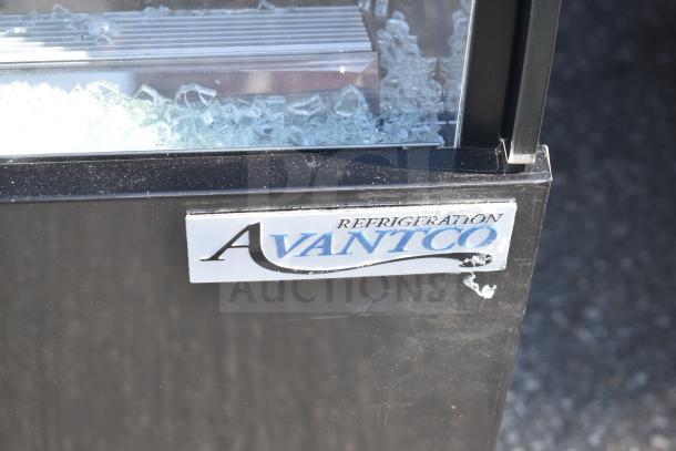 Avantco 193CAC48B Grab N Go Merchandiser with broken glass, refrigeration label visible, 115V, 1 Phase.