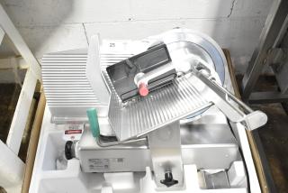 2019 Bizerba GSP HD meat slicer, 120V, 1 phase, excellent condition, clear markings, with safety warning tag.
