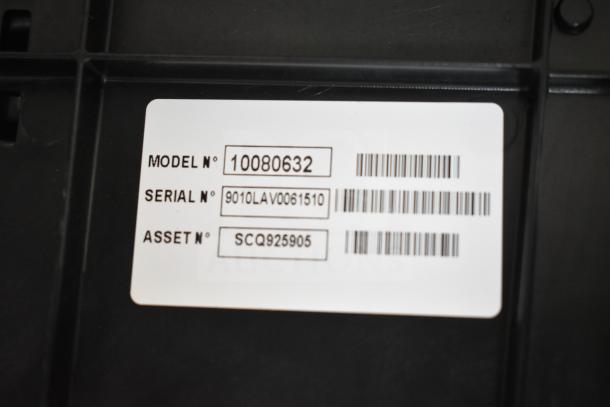 LavAzza 10080632 espresso machine with steam wand, 115V, 1 Phase. Label shows model, serial, and asset numbers.