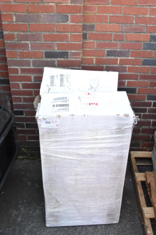 Brand new JS Products utility cart in original packaging. Scratch and dent condition. Shipping labels visible.