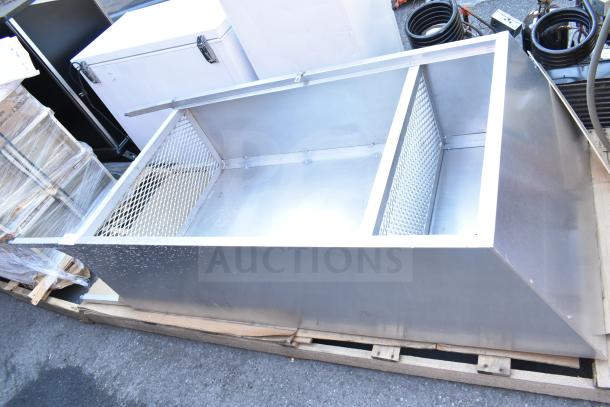 Metal locker cubby with mesh sides, silver finish, good condition. Ideal for storage, measures approximately 4 feet in length.