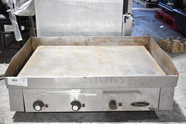 Star Commercial Electric Griddle, countertop flat top, used condition, visible controls and brand logo, showing wear.
