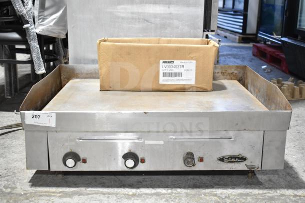 Star Commercial Electric Flat Top Griddle, countertop model. Features: dual control knobs, used condition, visible branding.