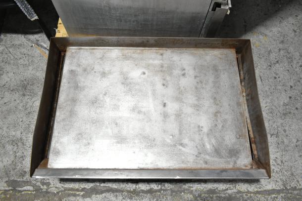 Star Commercial Electric Flat Top Griddle, countertop model, visible wear, clean griddle surface, sturdy construction.