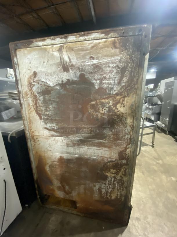 Commercial stainless steel double stacked convection oven, Model 648 M, worn condition with visible rust, gas powered.