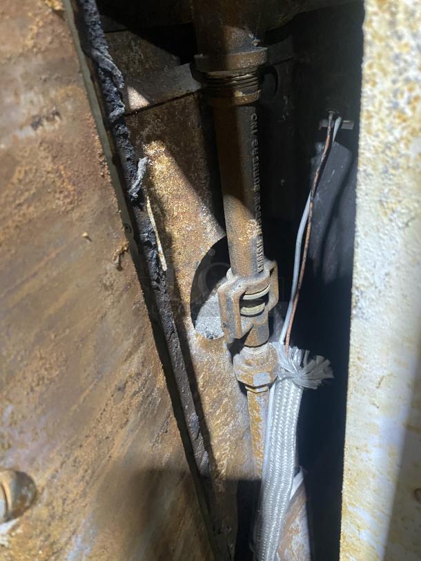 Rusted interior component of Commercial Stainless Steel Gas Powered Double Stacked Convection Oven, Model 648 M.