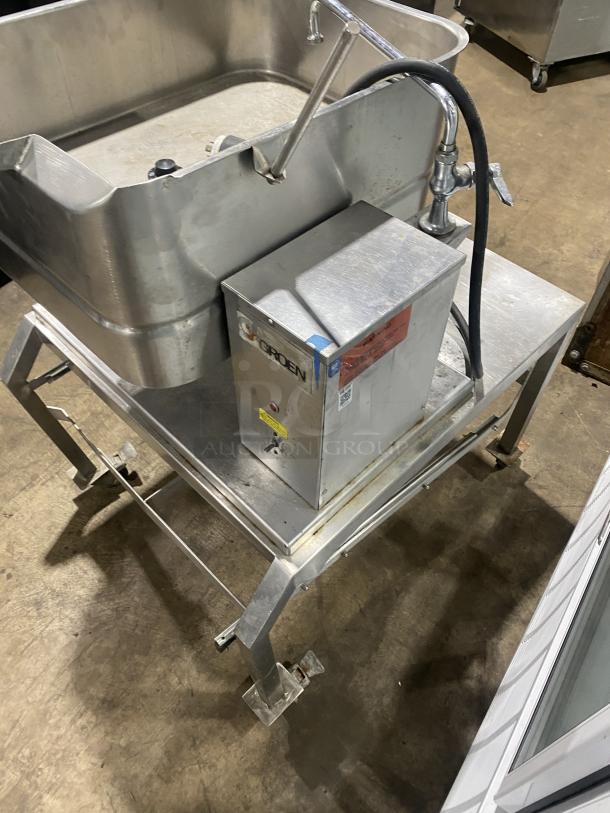 Groen TD/FPC stainless steel tilting skillet, natural gas powered, 208V, on casters. Model: TD/FPC, SN: 2306CDF.