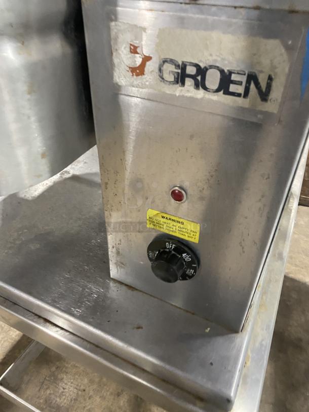 Groen commercial stainless steel tilting skillet, model TD/FPC, natural gas, 208V, on casters. Visible brand logo and control knob.