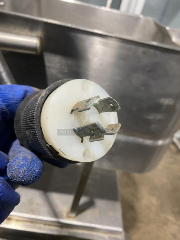 Groen TD/FPC tilting skillet in stainless steel, natural gas-powered, on casters, shown with a plug connector, in used condition.