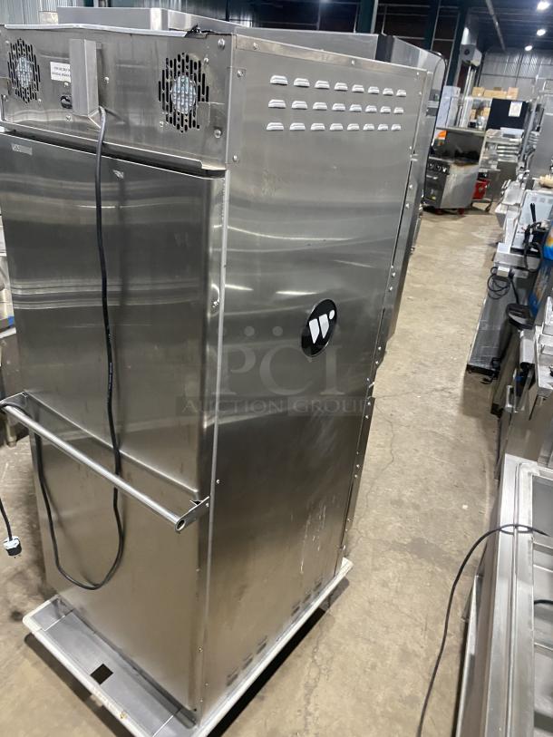 Winston commercial stainless steel insulated cabinet, Model HOV514UVE, SN: 20190904-0056, with two stacked Dutch doors, on casters.