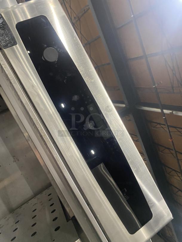 Winston commercial stainless steel cabinet, Model HOV514UVE, with two stacked Dutch doors, on casters, in used condition.