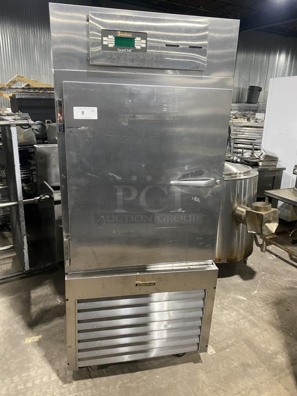 Traulsen RBC100 commercial stainless steel blast chill freezer on casters, 208-230V 1 Phase, Model: T09031K05, visible label.