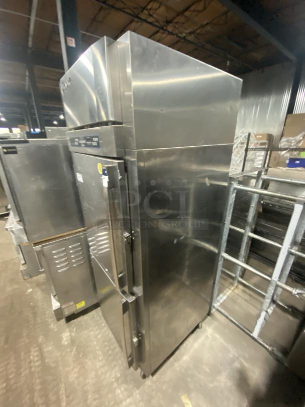 Victory UltraSpec stainless steel refrigerator, model HRSA-1D-S1EWHDSPEC183, with half doors and casters, in industrial setting.