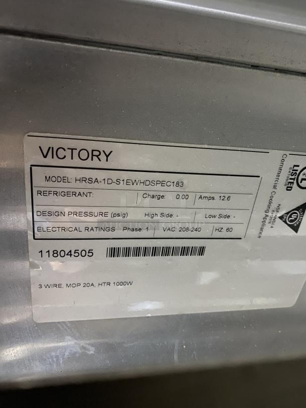 Victory UltraSpec Stainless Steel Refrigerator, model HRSA-1D-S1EWHDSPEC183, on casters, tag detail showing specifications.