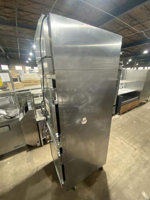 Victory UltraSpec RSA1DS1HDSPEC121 refrigerator, stainless steel, 2 half-height doors, on casters, 115V, 1 phase, visible logo.