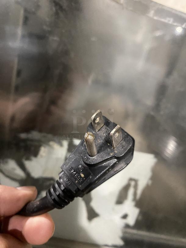 Close-up of a power plug for a Victory RSA1DS1HDSPEC121 UltraSpec Series refrigerator, indicating 115V, 1 Phase.