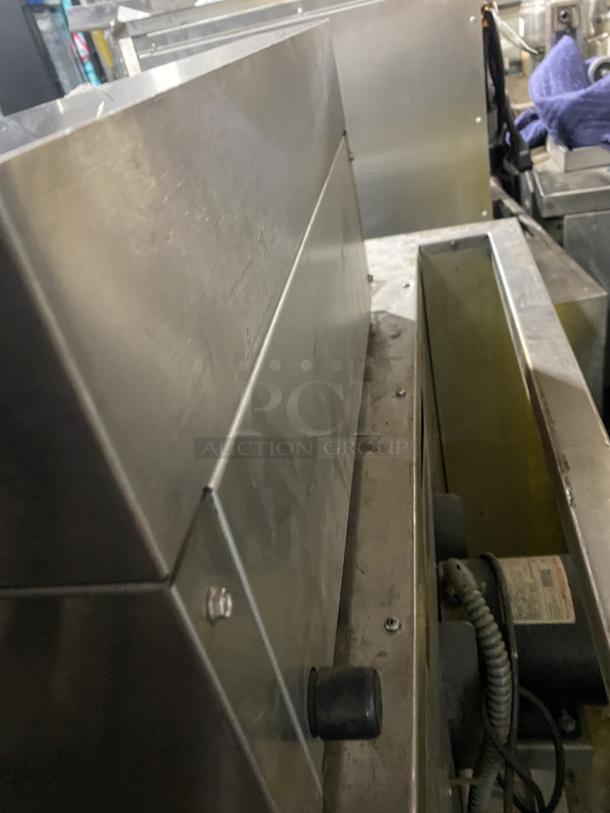 Cayvo CVCB-24LP stainless steel gas char-rock broiler; commercial-grade; visible control knobs; used condition.