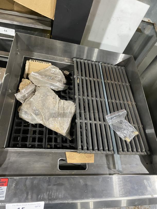 Cayvo CVCB-24LP stainless steel gas char-rock broiler in good condition, featuring cast iron grates, visible accessories included.