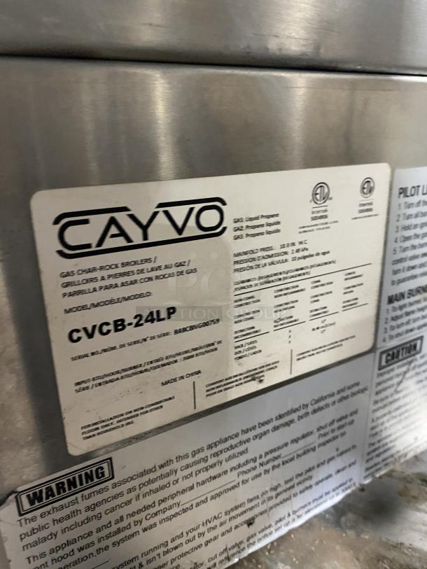 Cayvo Commercial Stainless Steel Gas Char-Rock Broiler, Model CVCB-24LP, with label indicating specifications and warnings.