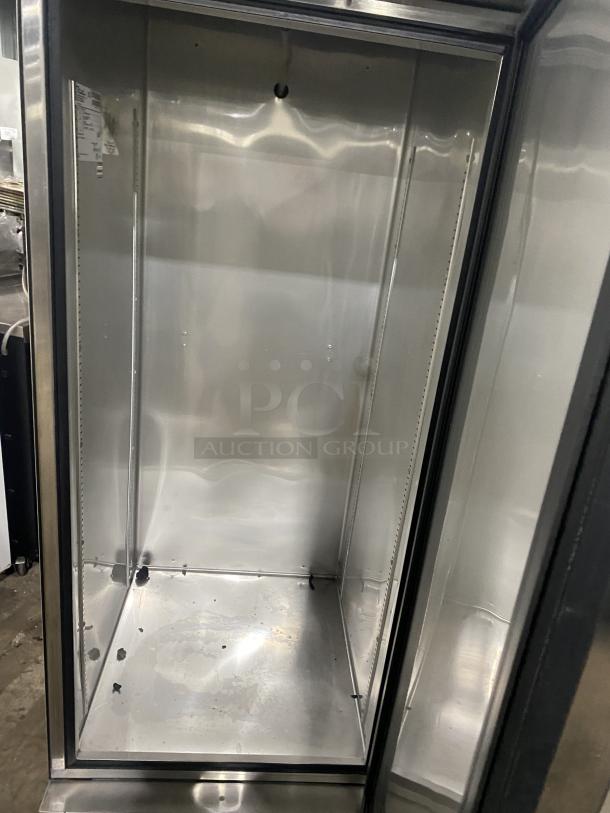 True Low Boy Freezer T-23F-HC on casters, stainless steel, model SN: 8761908, 115V 1PH, clean interior, tag visible.