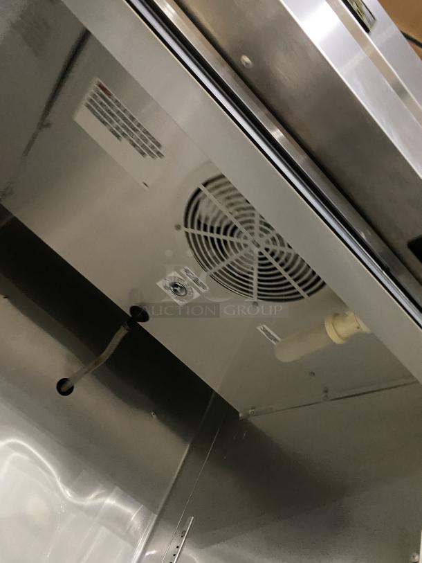 True Freezer Low Boy T-23F-HC, stainless steel, on casters, interior view showing fittings and fan, SN: 8761908, 115V 1PH.
