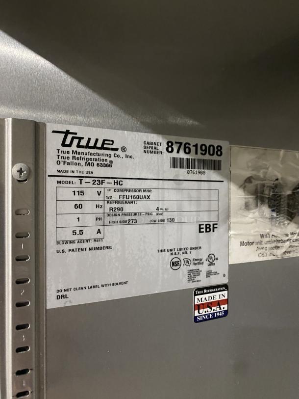 True T-23F-HC low boy freezer on casters, stainless steel, 115V 1PH, SN: 8761908, NSF certified. Made in USA label.