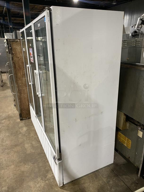 Master Bilt commercial display refrigerator, white, Model BMD-74, with 12 shelves, 3 glass doors, SN: 166269 NCC01, 115V 1 PH.