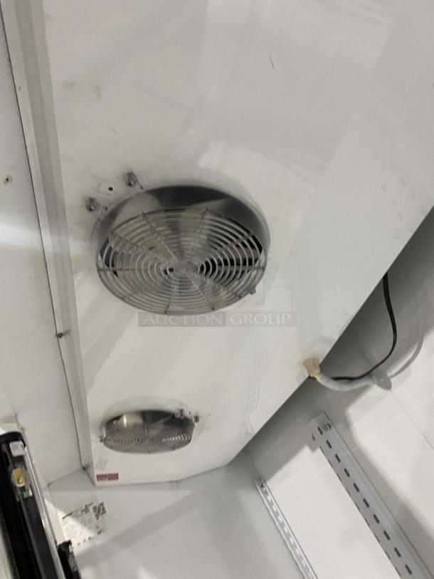 Master Bilt Commercial Refrigerator, Model BMD-74, 3 glass doors, 12 shelves, white, 115V, SN: 166269 NCC01, with fans.