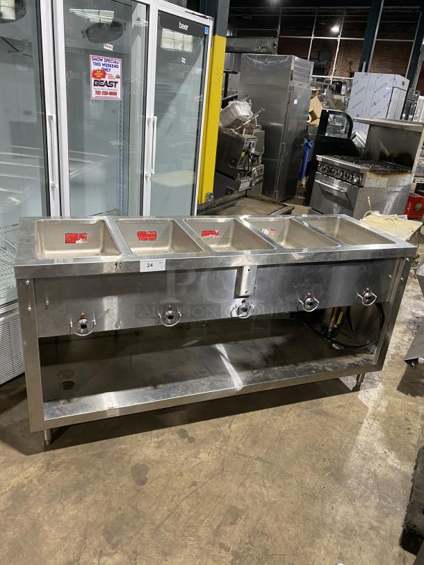 Duke E305-25SS-SWM stainless steel hot food table, 5 openings, on legs, commercial use, 208V, 1 PH, SN: 03210073.