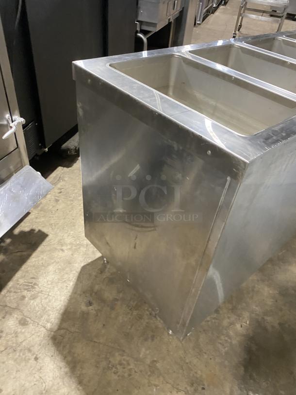 Duke E305-25SS-SWM stainless steel electric hot food table, 5 openings, undershelf, 208V, on legs, good condition.