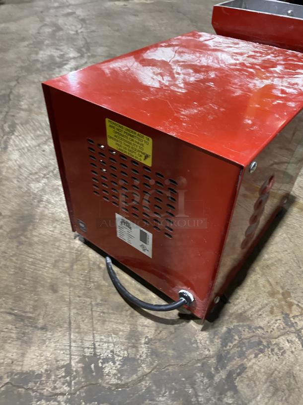 Olde Tyme PN2 peanut butter grinder machine, red casing, 115V, with visible safety and information labels, SN: A16070912.