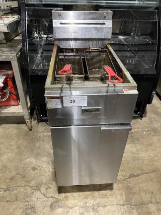 Migali C-F40-NG stainless steel deep fat fryer, natural gas powered, with back splash, basket hanger, and frying baskets.