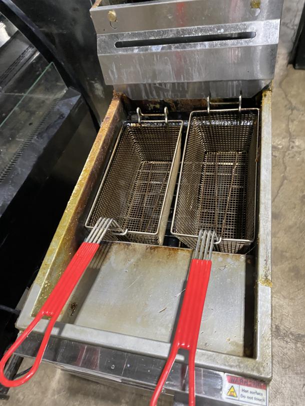 Migali C-F40-NG stainless steel deep fat fryer, natural gas powered, with splashback, basket hanger, and frying baskets. On casters.