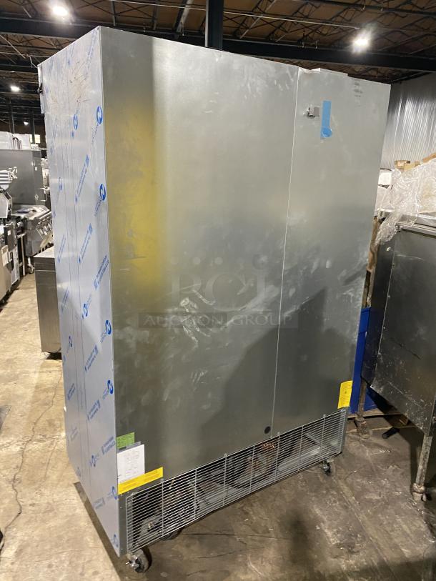 Kutano KUTF 2 SS stainless steel reach-in freezer, 2 doors, commercial-grade, model and serial number labels visible.
