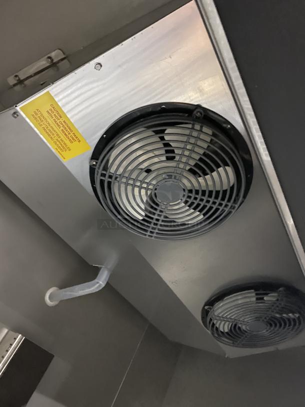 Kutano Commercial 2-Door Freezer, model KUTF 2 SS, stainless steel interior view showing fan units, SN: 8103206950.