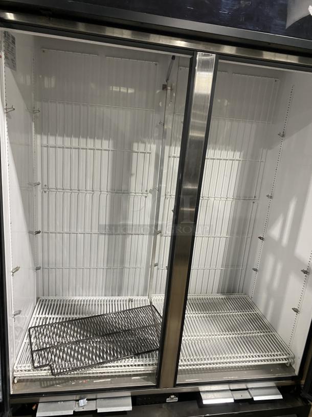 True commercial freezer, model GDM-49F-HC-TSL01. Stainless steel, dual glass doors, all-black body, 1 phase, 116-208-230V.