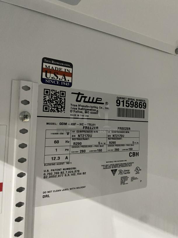 True commercial freezer GDM-49F-HC-TSL01 label, Model: GDM-49F- HC- TSL01, SN: 9159869, 116-208-230V, 1 Phase. Made in USA.