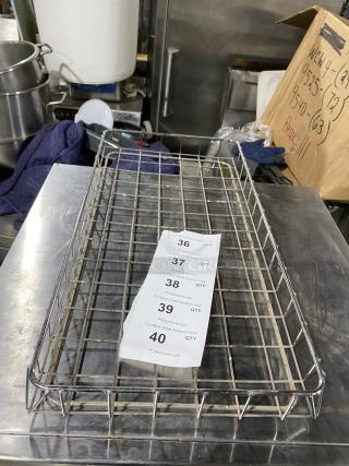 Chrome plated full-size bagel/pastry wired rack in good condition with auction label. Ideal for commercial use.