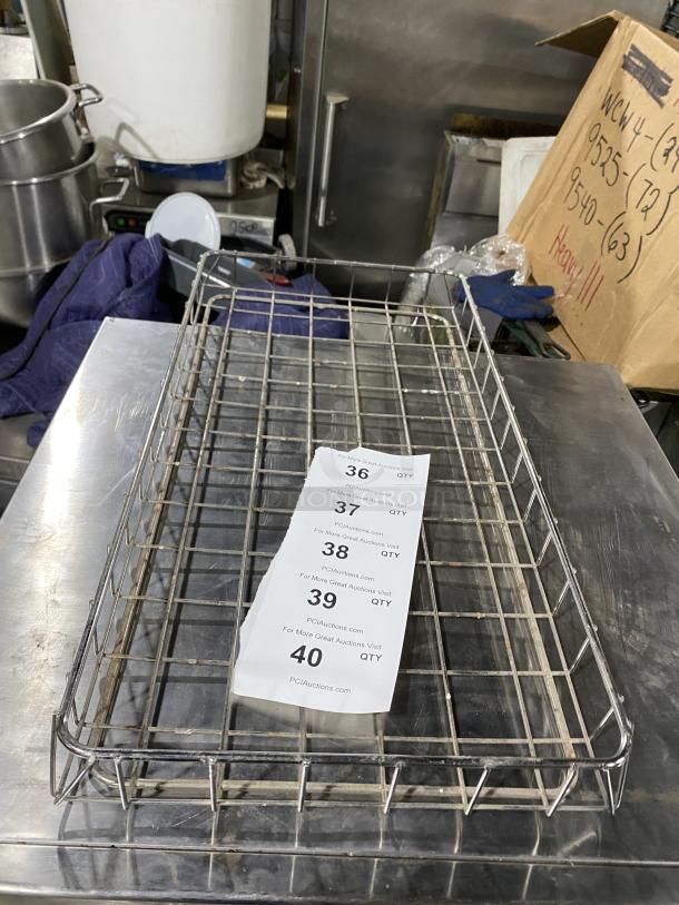 Chrome-plated full-size bagel/pastry wire rack in excellent condition, rectangular shape, with auction lot tags.