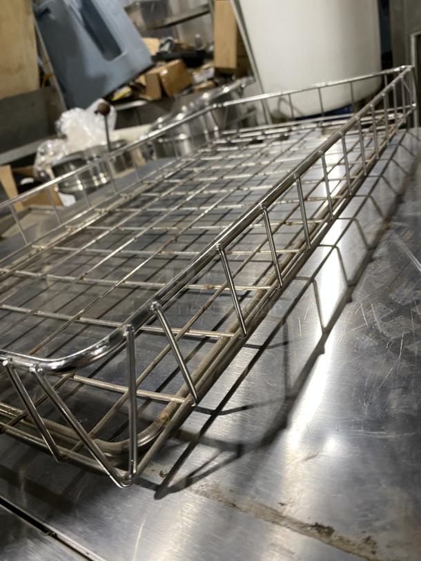 Commercial chrome-plated full-size bagel/pastry wired rack, excellent condition, durable construction, ideal for bakeries.