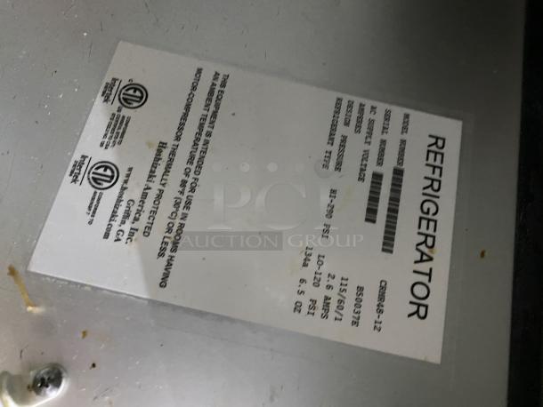 Hoshizaki commercial stainless steel refrigerator label, model CRMR48-12, SN: B50037E, showing specifications and certifications.