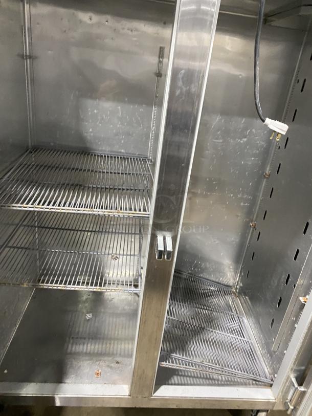 True Commercial Series Stainless Steel Refrigerator, Model STG2R-2G, 2 Glass Doors, Reach-In, 115V, used, clean interior.