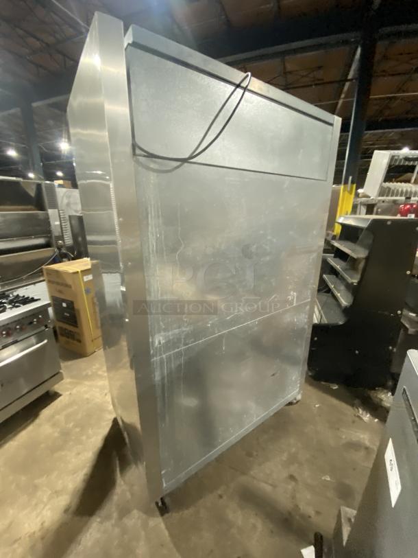 True Commercial Series stainless steel refrigerator, model STG2R-2G, two-section, glass doors, slight wear.