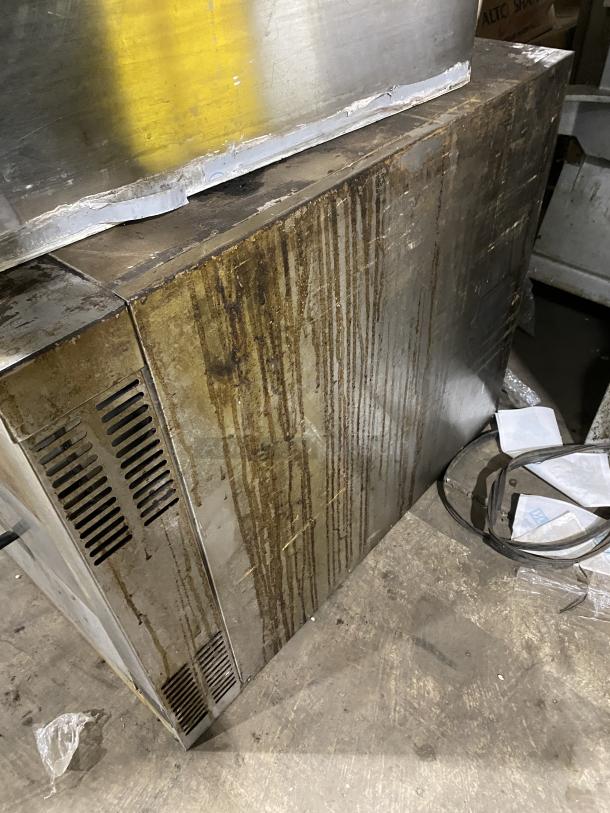 Bakers Pride GP-51 commercial stainless steel countertop deck oven, natural gas, used condition with visible wear.